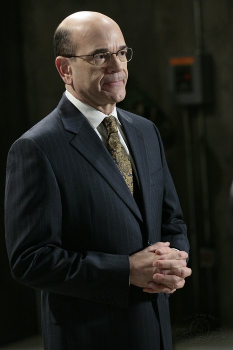 The I.O.A.'s Mr. Richard Woolsey (Robert Picardo) prepares to take over command of the Atlantis expedition.
