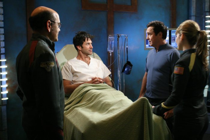 Sheppard (Joe Flanigan) recovers in the infirmary after his harrowing ordeal.
