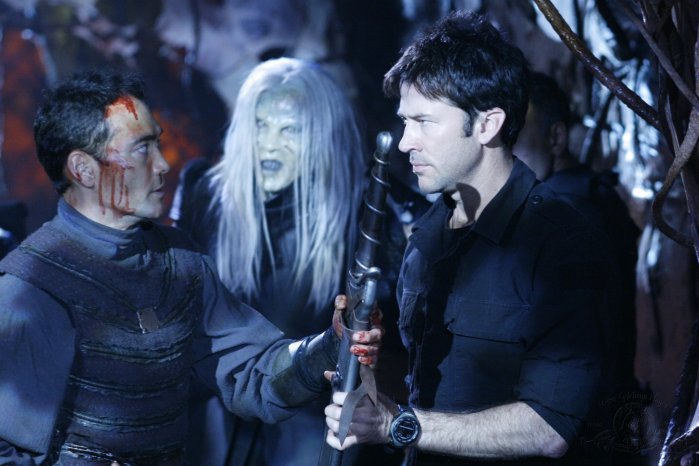 Tyre (Mark Dacascos) attempts to convince Sheppard (Joe Flanigan) that they must work together.
