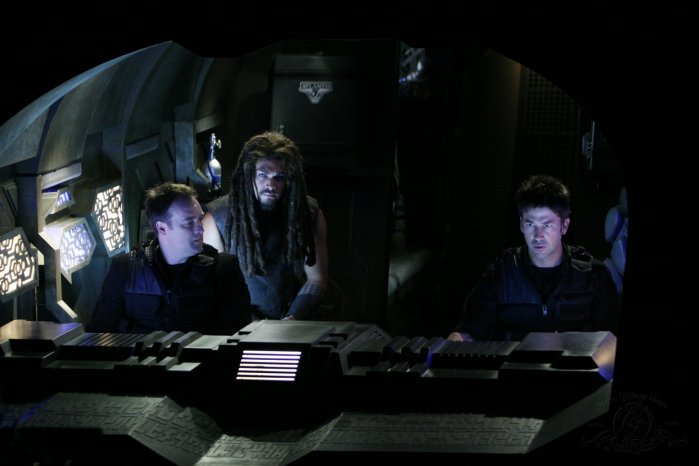 Ronon Dex (Jason Momoa), John Sheppard (Joe Flanigan), and Rodney McKay (David Hewlett) go along with the Wraith Todd's very dangerous plan.
