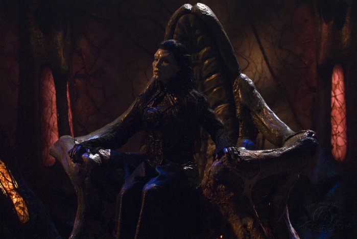 Surgically altered to appear as a Wraith hive queen, Teyla (Rachel Luttrell) must convince another hive and its queen that she is one of them.

