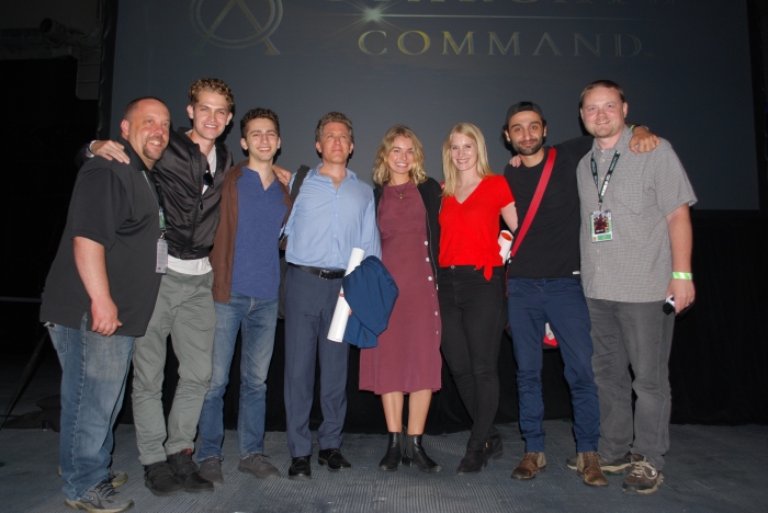 Chad Colvin (left) and Darren Sumner (right) with the cast of Stargate Origins at the Midway premiere party
