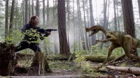 "Angelika Finch" (Miranda Frigon) attempts to fight off a dino baddie in this scene from the series.