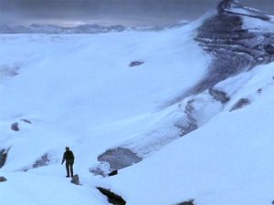 Solitudes (SG-1 117) - Sam on the Glacier