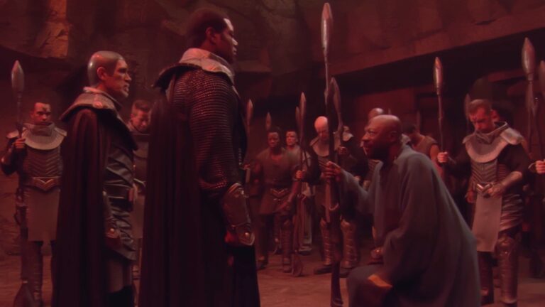 Tolok leads the Jaffa in kneeling before Bra'tac and Teal'c ("Threads")